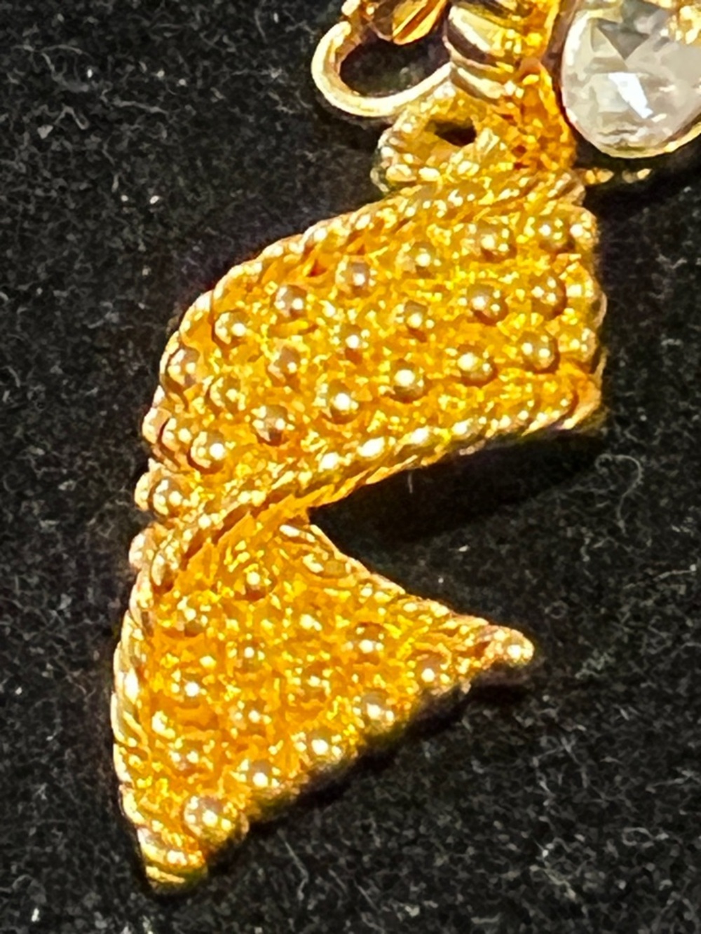 Swarovski Gold-Tone Twisted Drop Clip on Earrings with Clear Crystals - Picture 5 of 7